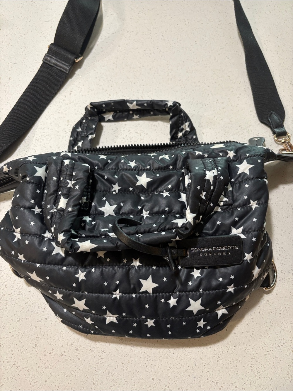 Sondra Roberts Black Quilted Star-Print Crossbody Bag